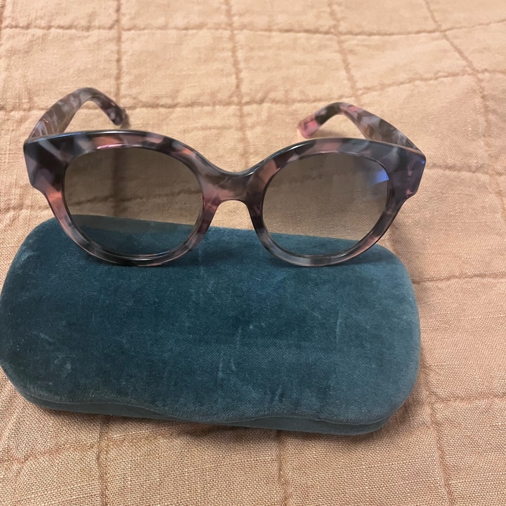 Gucci sunglasses.